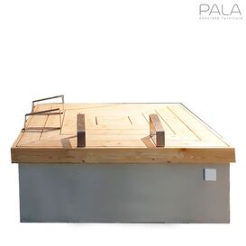 Komfortable Sitzinsel aus Beton und Lrche fr die...
